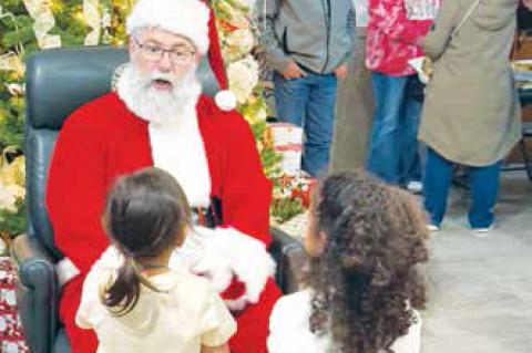 Children had the opportunity to visit with Santa inside the Terry County Courthouse Monday evening, telling him what they would like for Christmas.