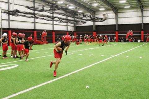 Brownfield football opens with midnight conditioning