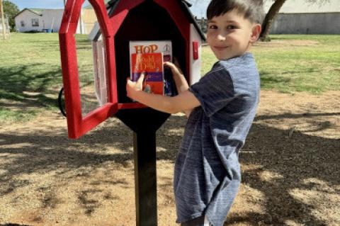 Clanton Helps Bring Books to Meadow Community