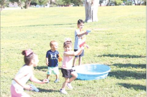 Terry County youth enjoy a cooling off time after the completion of the library summer reading program last week. (Photos by Lupe Perez)