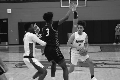 Brownfield’s Quavience Busby (4) looks to pass the pass as Levelland’s Eryk Jones (3) works on defense while being pressured by Brownfield’s Kameron Gibson (left) during a nondistrict game on Tuesday at The Pit at Brownfield.