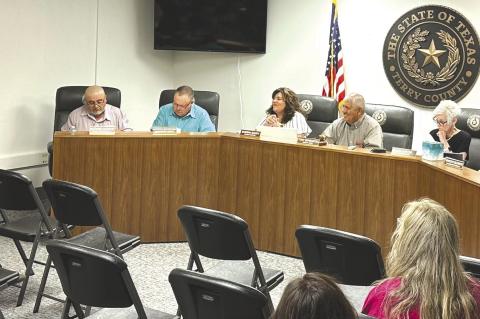 Terry County Commissioners hear an audit report from Tyler Kennedy from Bolinger, Segars, Gilbert &amp; Moss. (Photo by News staff)