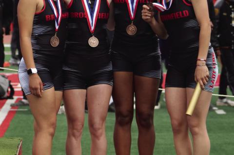Members of the Lady Cubs’ 4x100-meter relay team show off their medals after finishing third at the District 3-3A Championships on Thursday at Denver City to qualify for the area championship meet.