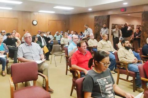 City employees protest change to dependent care insurance