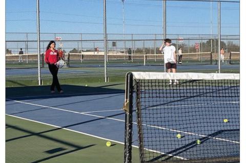 Brownfield’s Madison Bolton (left) and Ethan McPherson wait for teammates to serve to them during a practice on Tuesday at Brownfield. The Cubs and Maidens, along with the school’s other spring sports, began preparation for the 2025 schedule last week