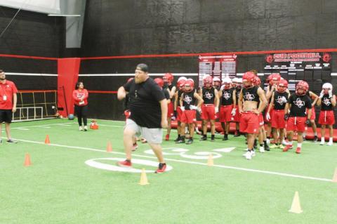 Brownfield football opens with midnight conditioning