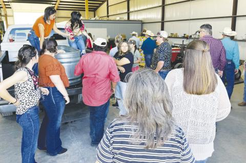 Those taking a tour of the farms during the 69th Annual Terry County Farm Tour take a break with refreshments at the Terry County Precinct No. 4 Barn. They also got to tour the barn as well as hear about several farms around the county on the tour. (Melis