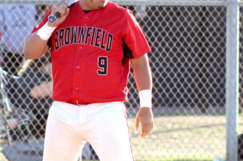 Cubs open district with a road win