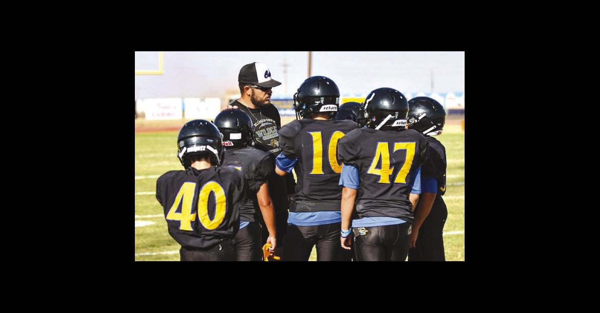 Wellman-Union coach Brett Labadie works with players during the 2024 season. Labadie, a 2015 graduate of Petersburg High School, was hired as the Wildcats head coach in April (COURTESY PHOTO/BRETT LABADIE)